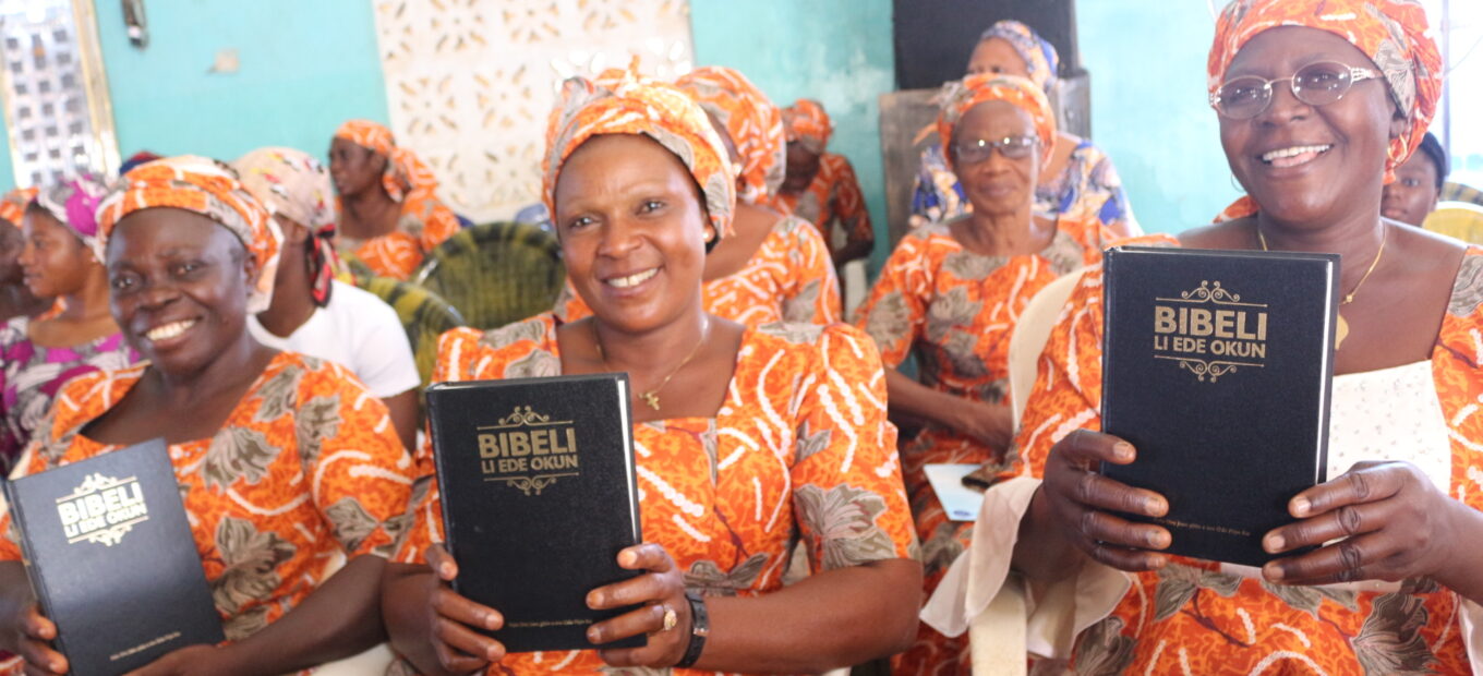 Okun women welcome their first Bible