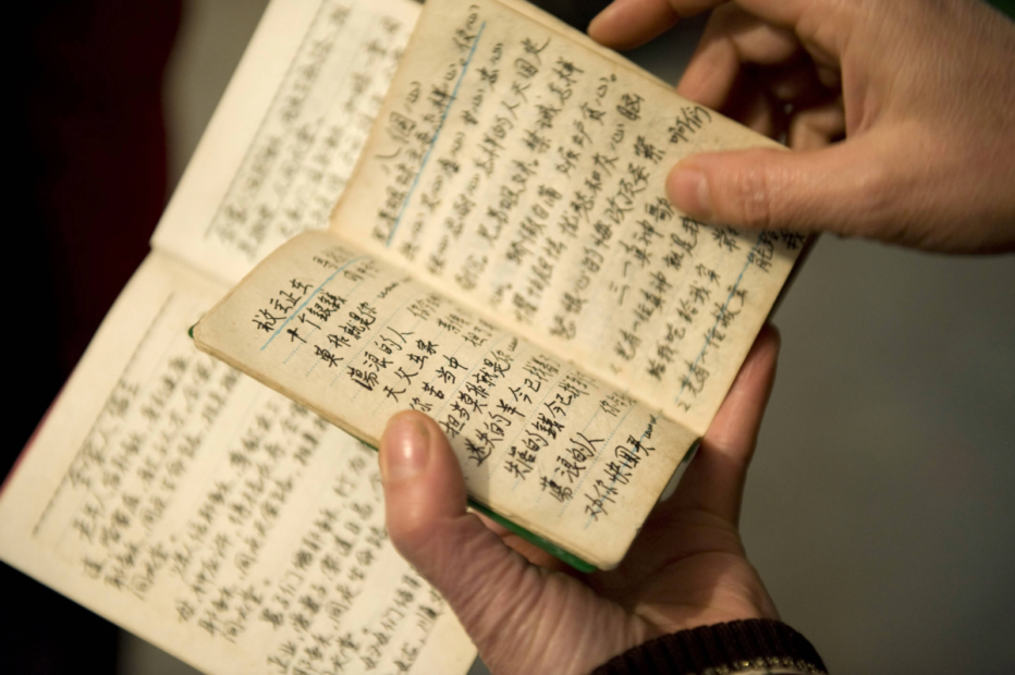 Von Hand kopierte Bibelverse und Hymnen, die von den Christen im Dorf Pai Kou geschätzt wurden, als es sehr schwer war, an die Bibel zu kommen. Provinz Hunan, China. Foto: Dag Smemo